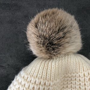 Cream colored pompom stylish winter beanie